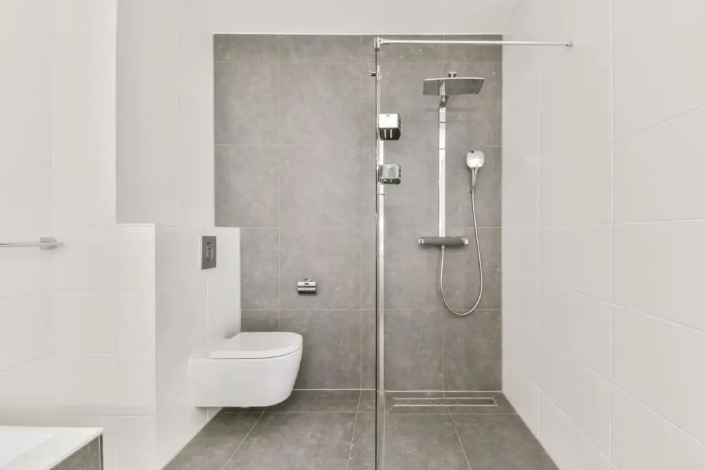 Modern bathroom with gray tiled floor