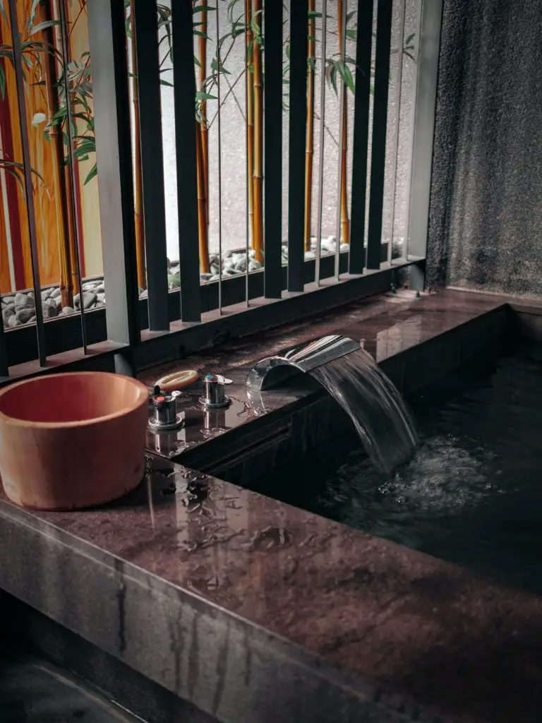 Clogged bathtub full of water