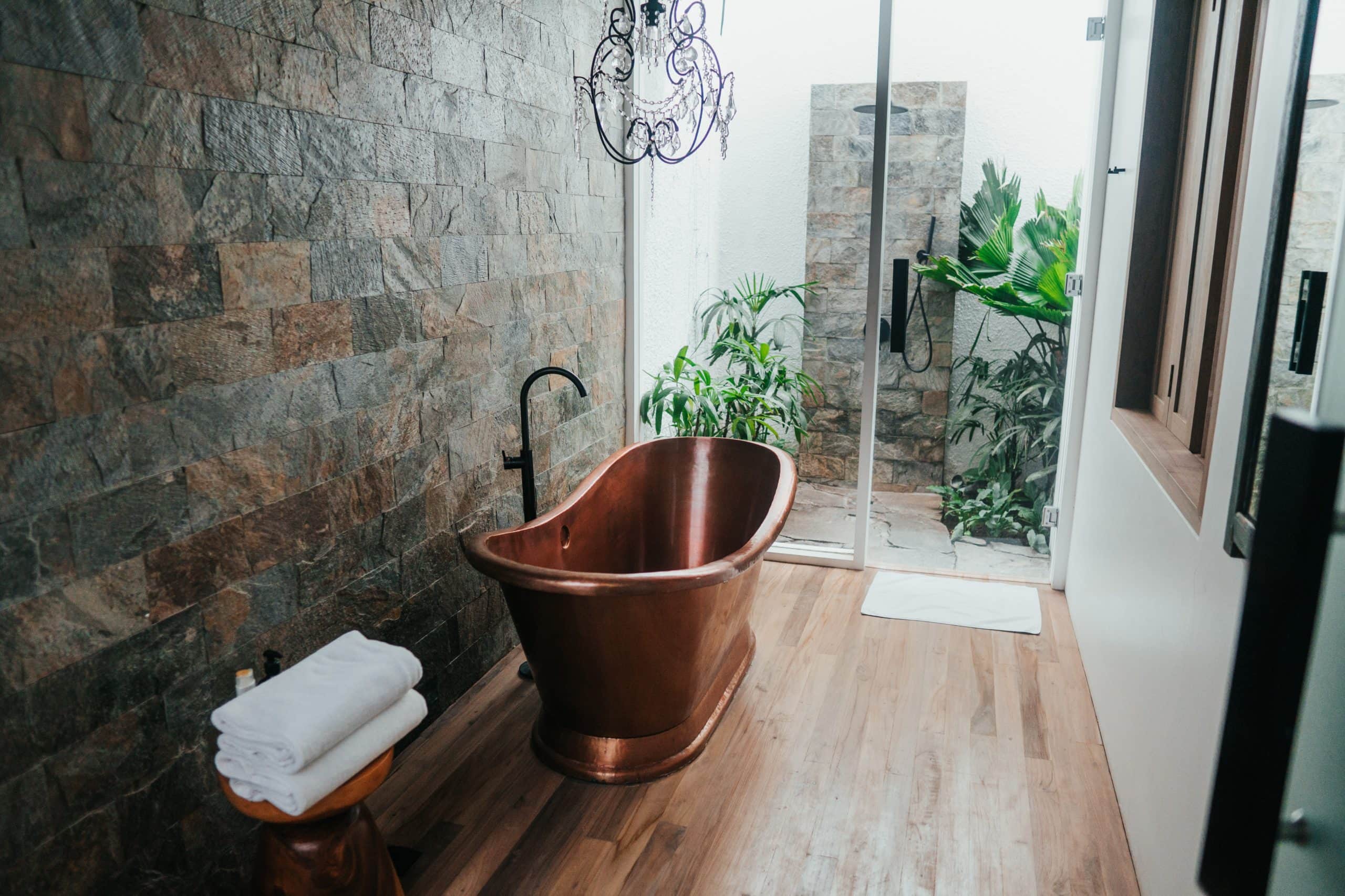 Folded towels near bathtub