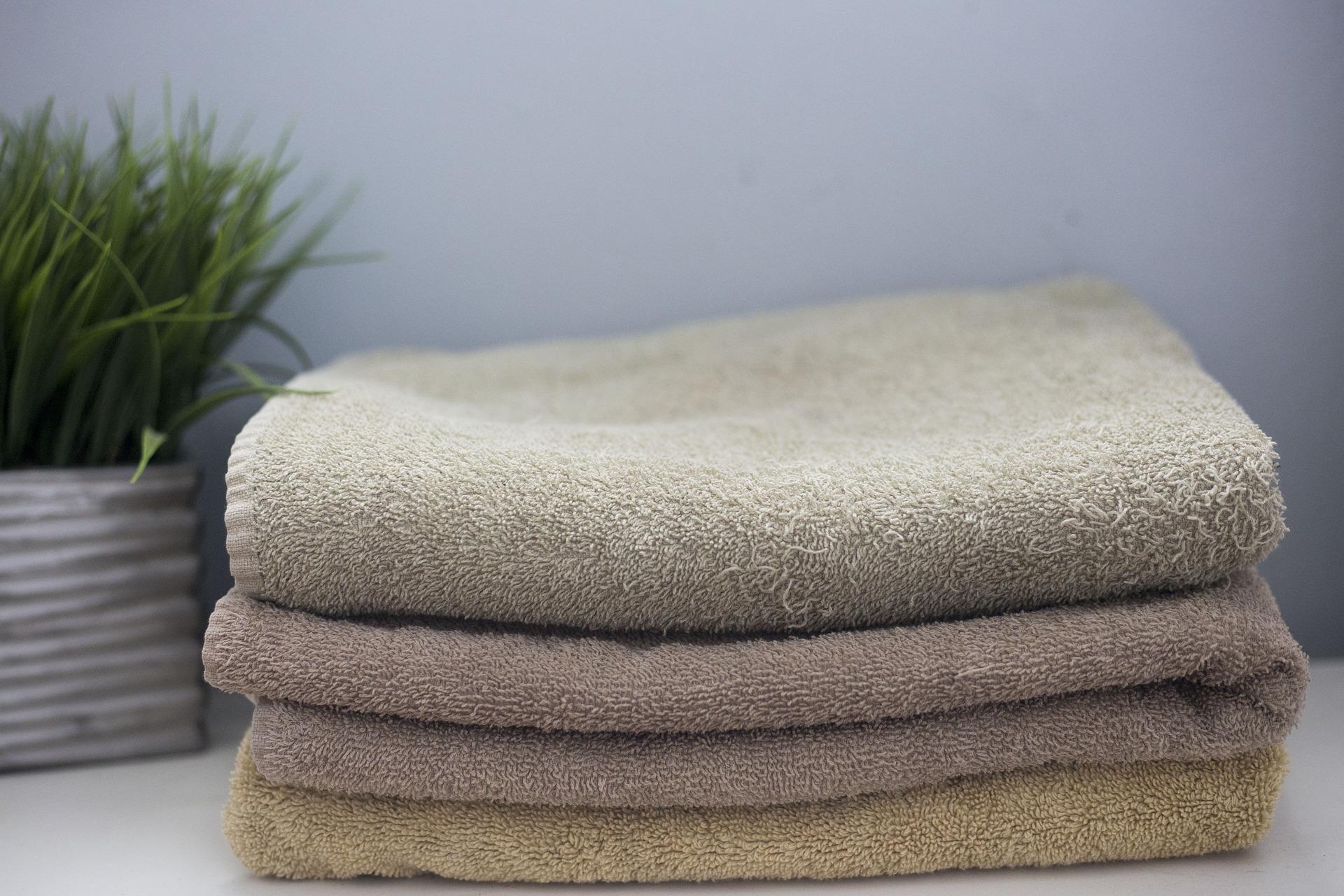 Brown towels for gray bathroom
